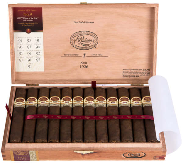 Open box of Padron 1926 No.9 Maduro cigars from Nicaragua, showcasing 24 cigars with rich dark wrappers in a wooden box.