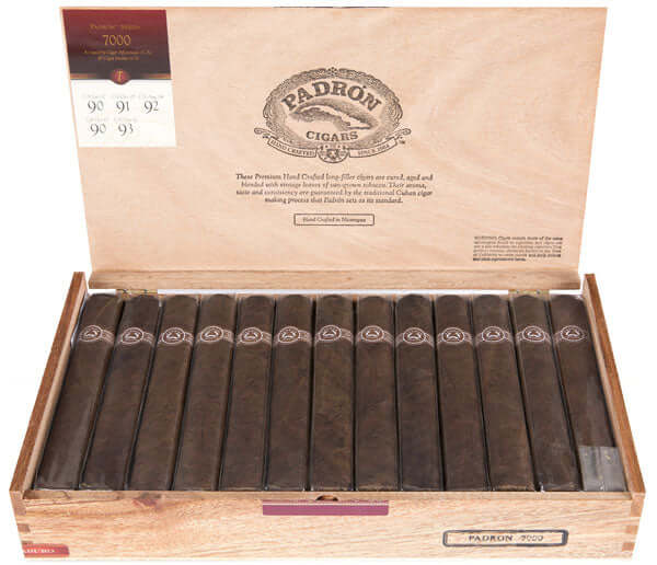 Open box of Padrón 7000 Natural cigars with visible labels, showcasing Nicaraguan Habano wrappers and premium packaging.