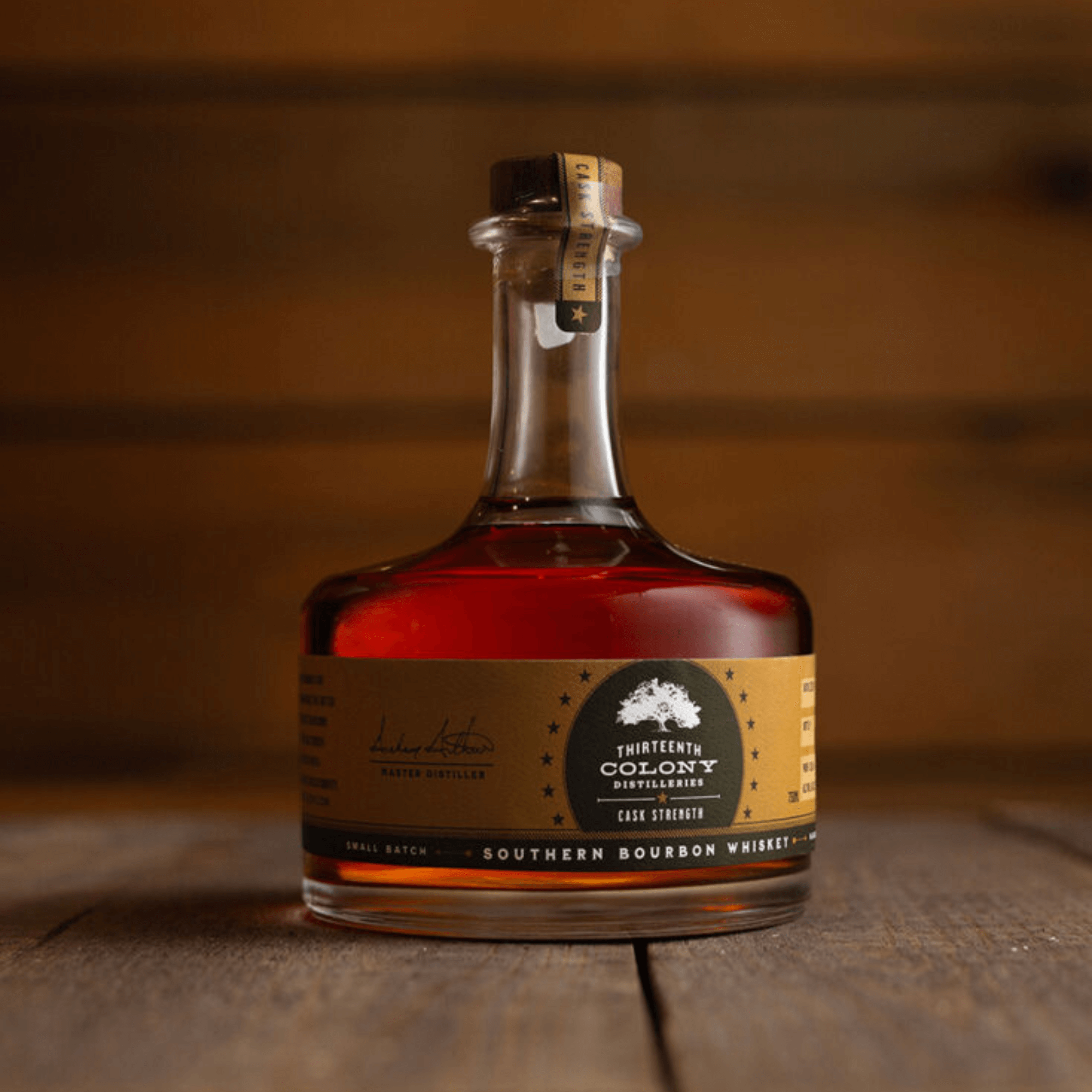 Thirteenth Colony Cask Strength Southern Bourbon Whiskey bottle, 750ml, displaying rich amber color and elegant label.