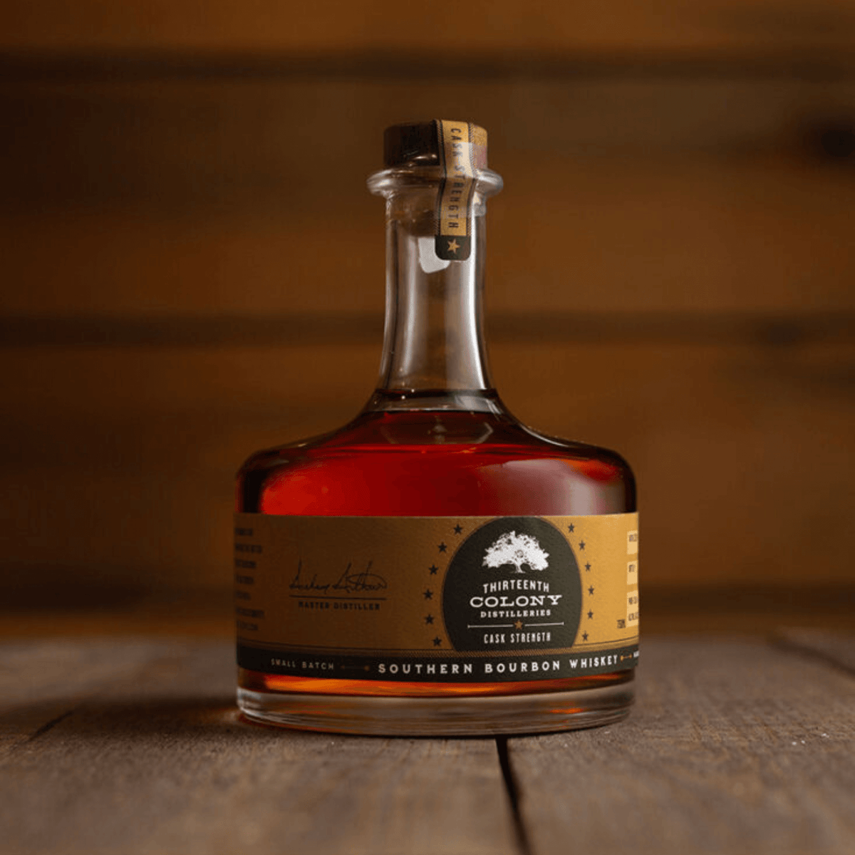 Thirteenth Colony Cask Strength Southern Bourbon Whiskey bottle, 750ml, displaying rich amber color and elegant label.