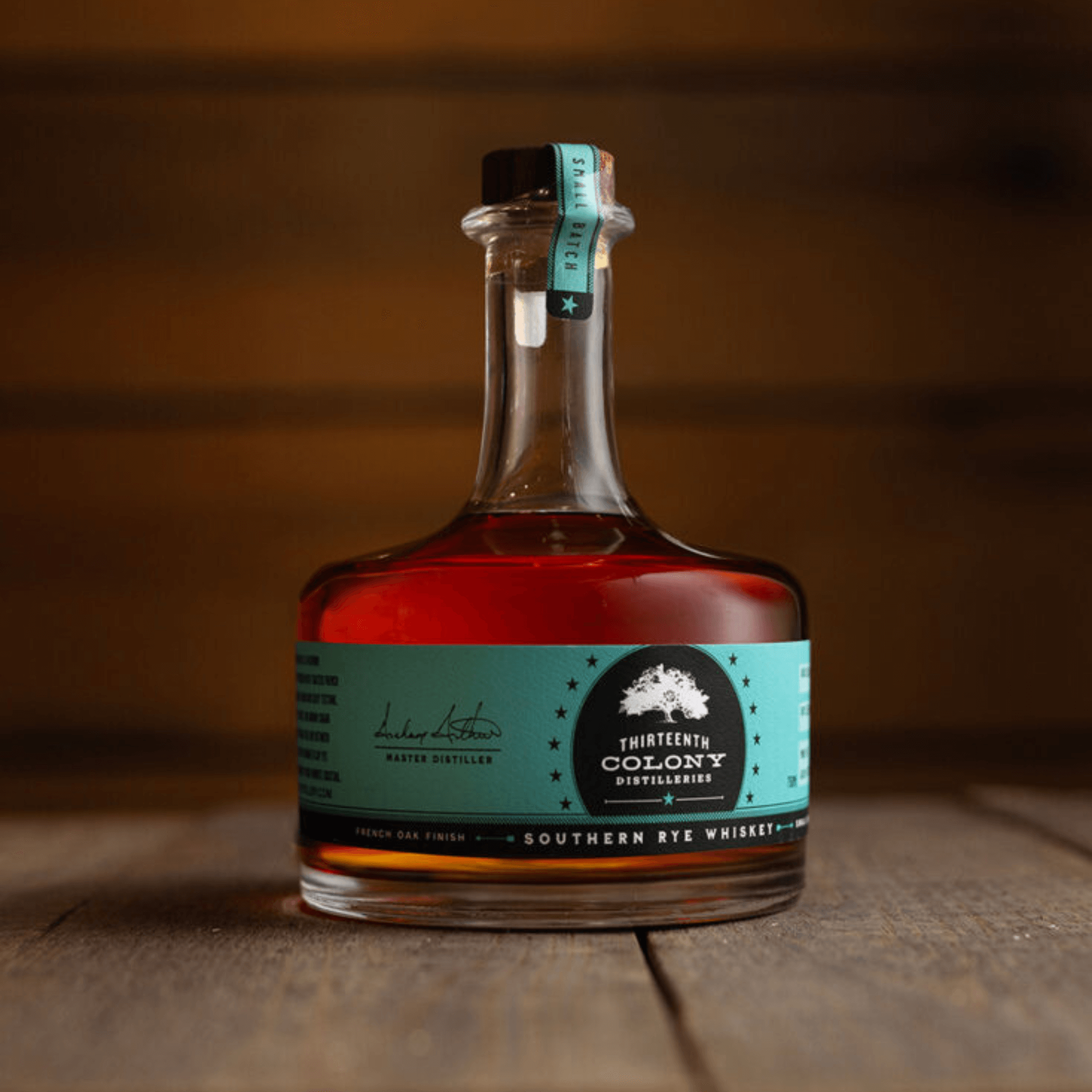 Thirteenth Colony French Oak Southern Rye Whiskey 750mL bottle with rich amber hue and teal label, 47.5% ABV from Georgia.