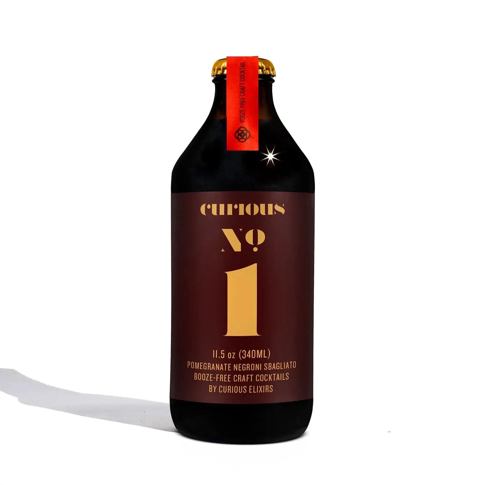 Curious Elixirs No.1 Pomegranate Negroni NA cocktail bottle, 11.5 oz, alcohol-free craft drink.