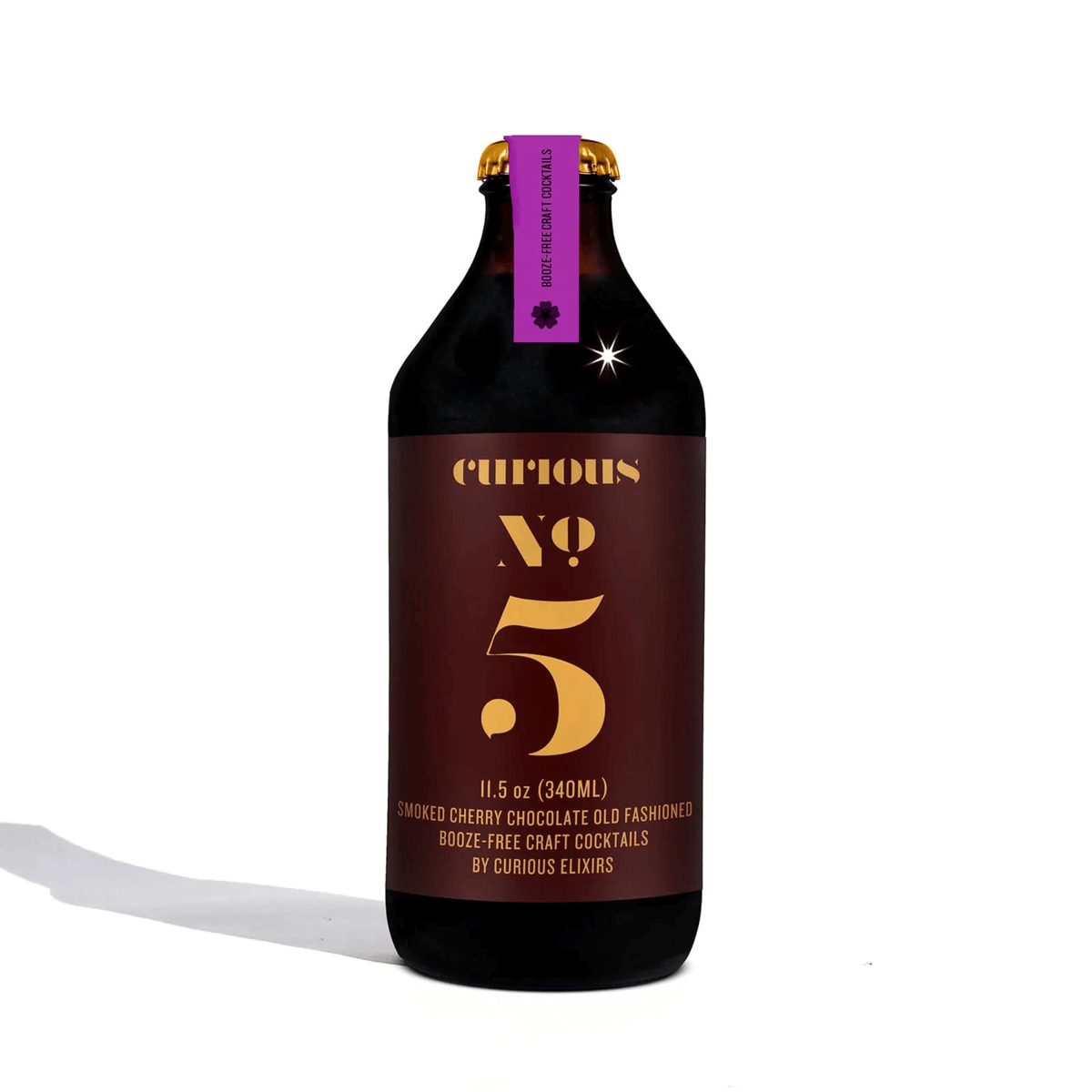 Curious Elixirs No. 5 non-alcoholic cocktail bottle with dark cherry and cacao flavors, 11.5 oz, crafted in New York.