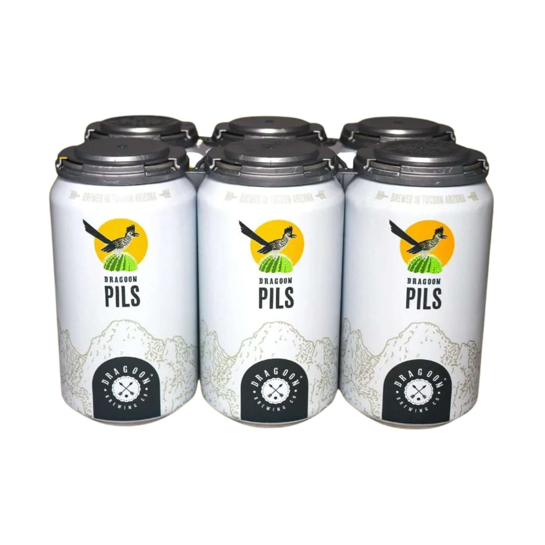 Six-pack of Dragoon Pils German-style pilsner cans from Dragoon Brewing Company, Tucson, Arizona, displaying brewery logo.