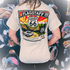 Back view of a person wearing a Flagstaff Liquor Route 66 T-Shirt, featuring a scenic design celebrating the iconic Mother Road.