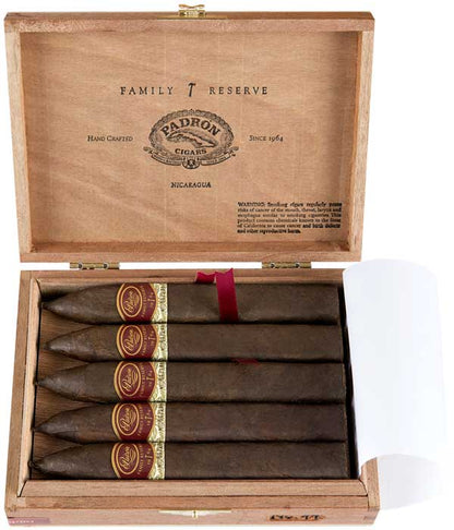 Box of Padron Family Reserve No. 44 Natural cigars, Nicaragua, with wooden box open displaying torpedo-shaped cigars.